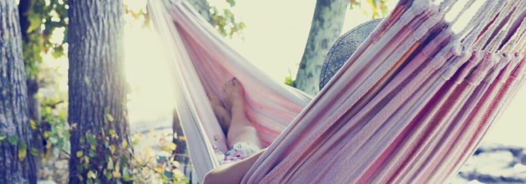 Girl Hanging in a hammock living a simple life
